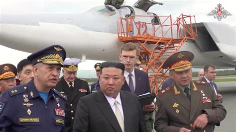 North Korea’s Kim Jong Un inspects Russian bombers and a warship on a visit to Russia’s Far East